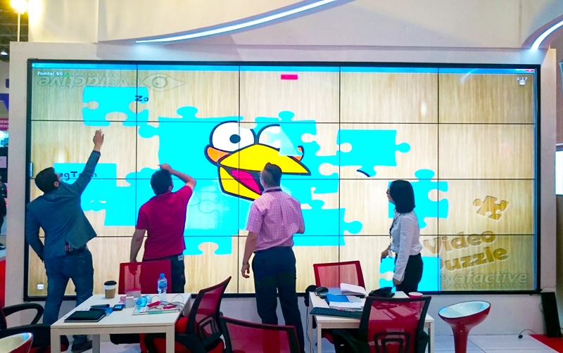 Touchscreen apps on giant video wall by ZaagTech